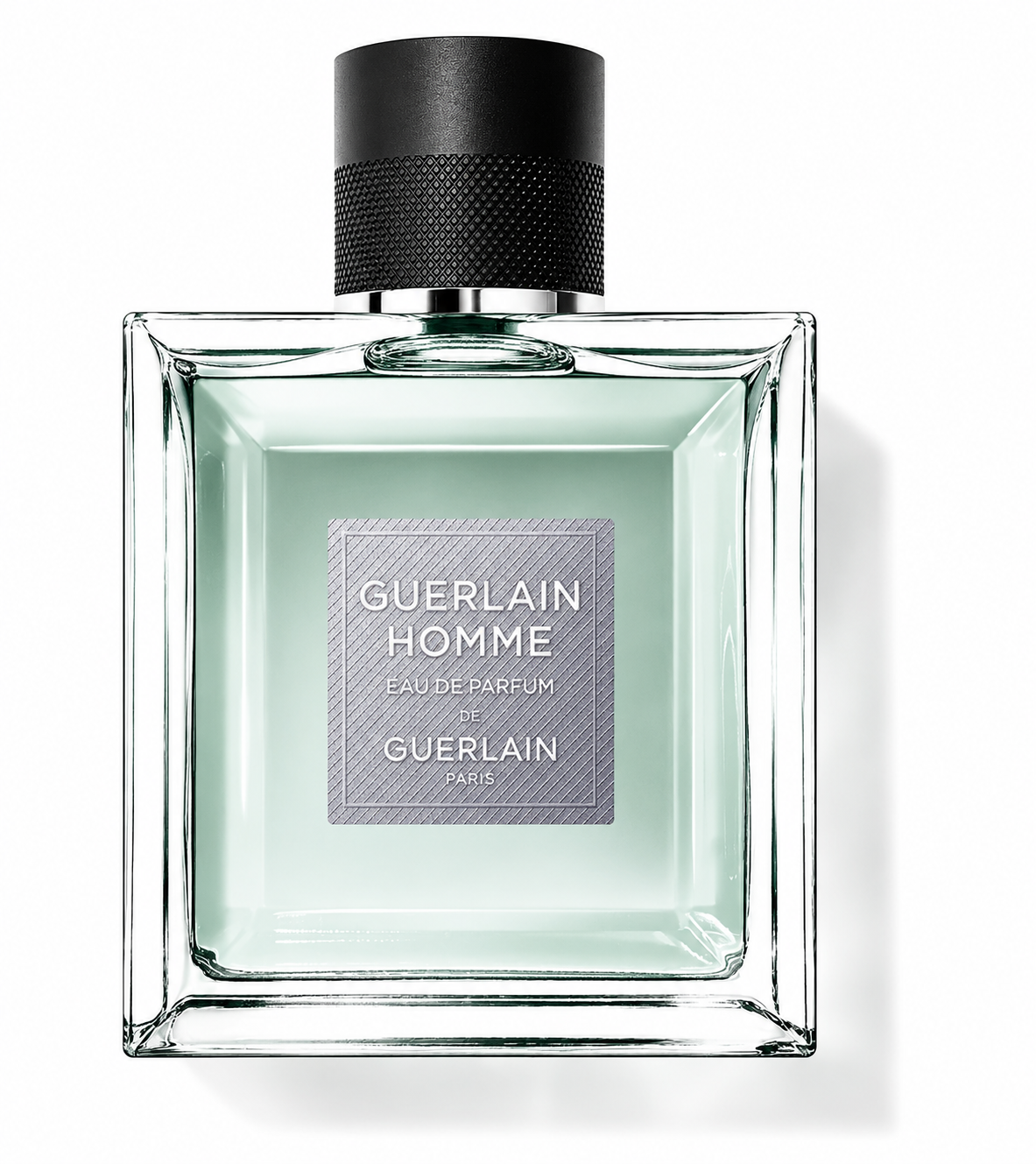 Guerlain Homme Eau de Parfum bottle, front-facing and centered on pure white background. Preserve the exact transparent square bottle, pale green liquid, black textured cap, silver details, original label and proportions. Clean studio lighting, subtle shadow, sharp photorealistic luxury product photography.