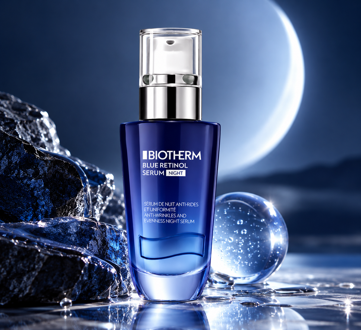 Biotherm Blue Retinol Serum Night displayed in an elegant nighttime setting with icy blue elements, water reflections and a crescent moon, highlighting its refreshing premium skincare aesthetic.