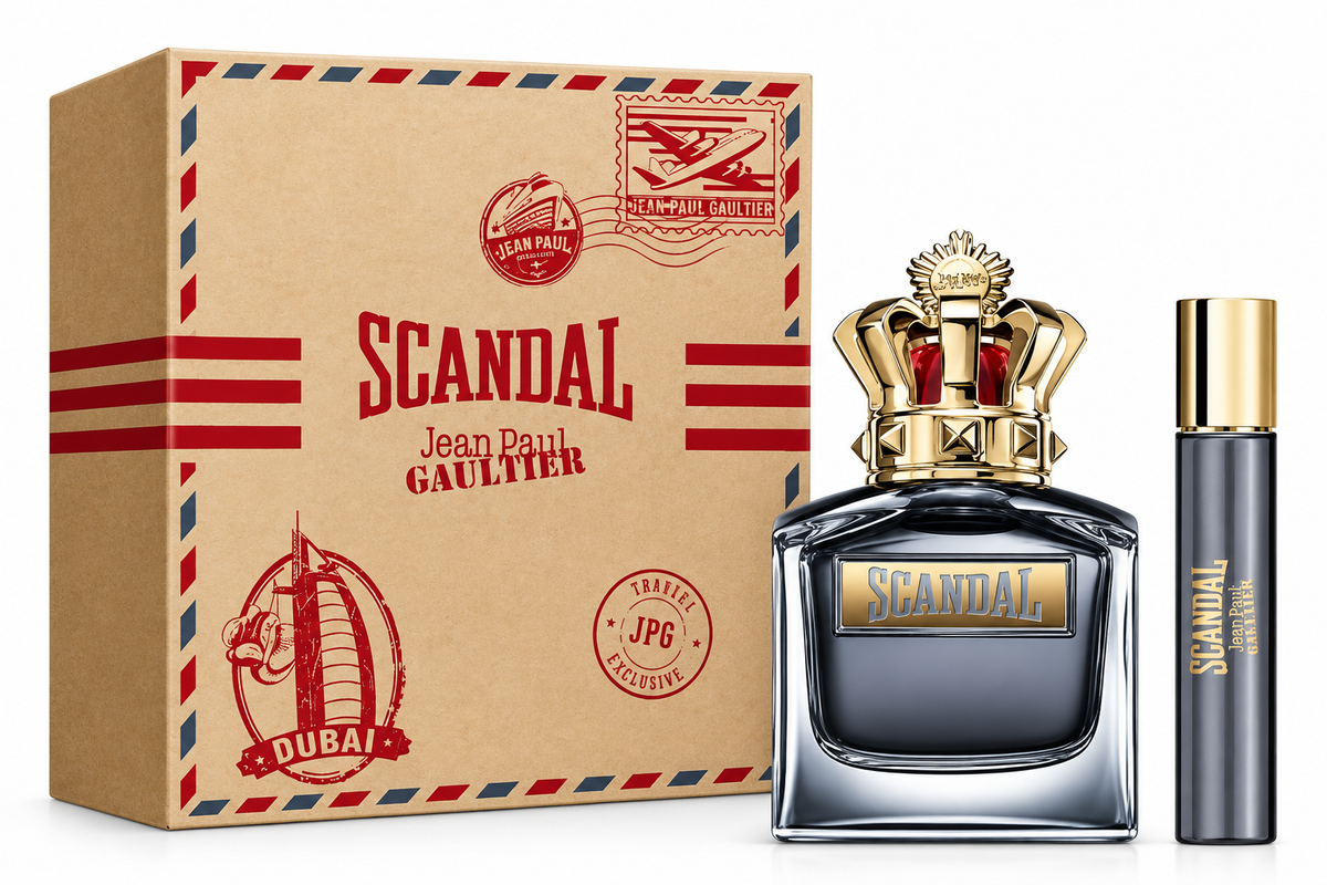 Jean Paul Gaultier Scandal Pour Homme gift set for men featuring the dark Scandal fragrance bottle with signature gold crown cap and matching travel spray, presented in a vintage travel-inspired Dubai gift box.