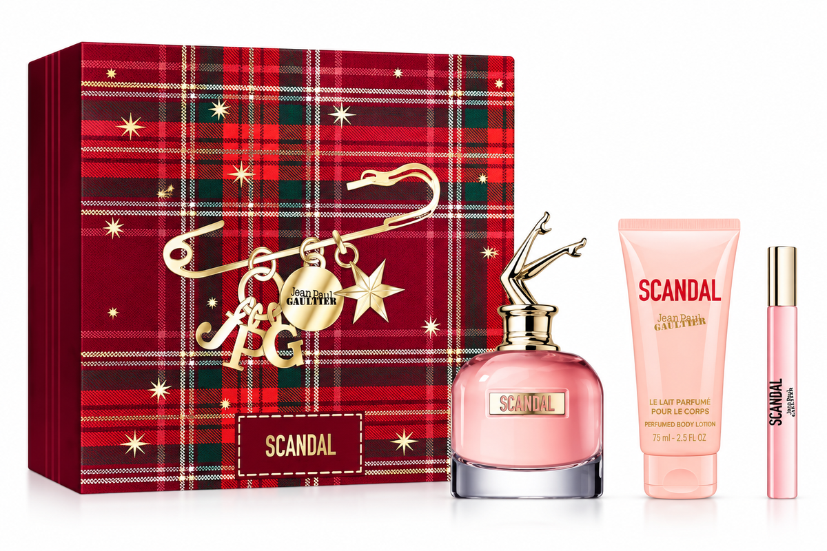 Jean Paul Gaultier Scandal gift set for women featuring the iconic pink Scandal perfume bottle, perfumed body lotion and travel spray, presented in an elegant red tartan festive gift box with gold details.