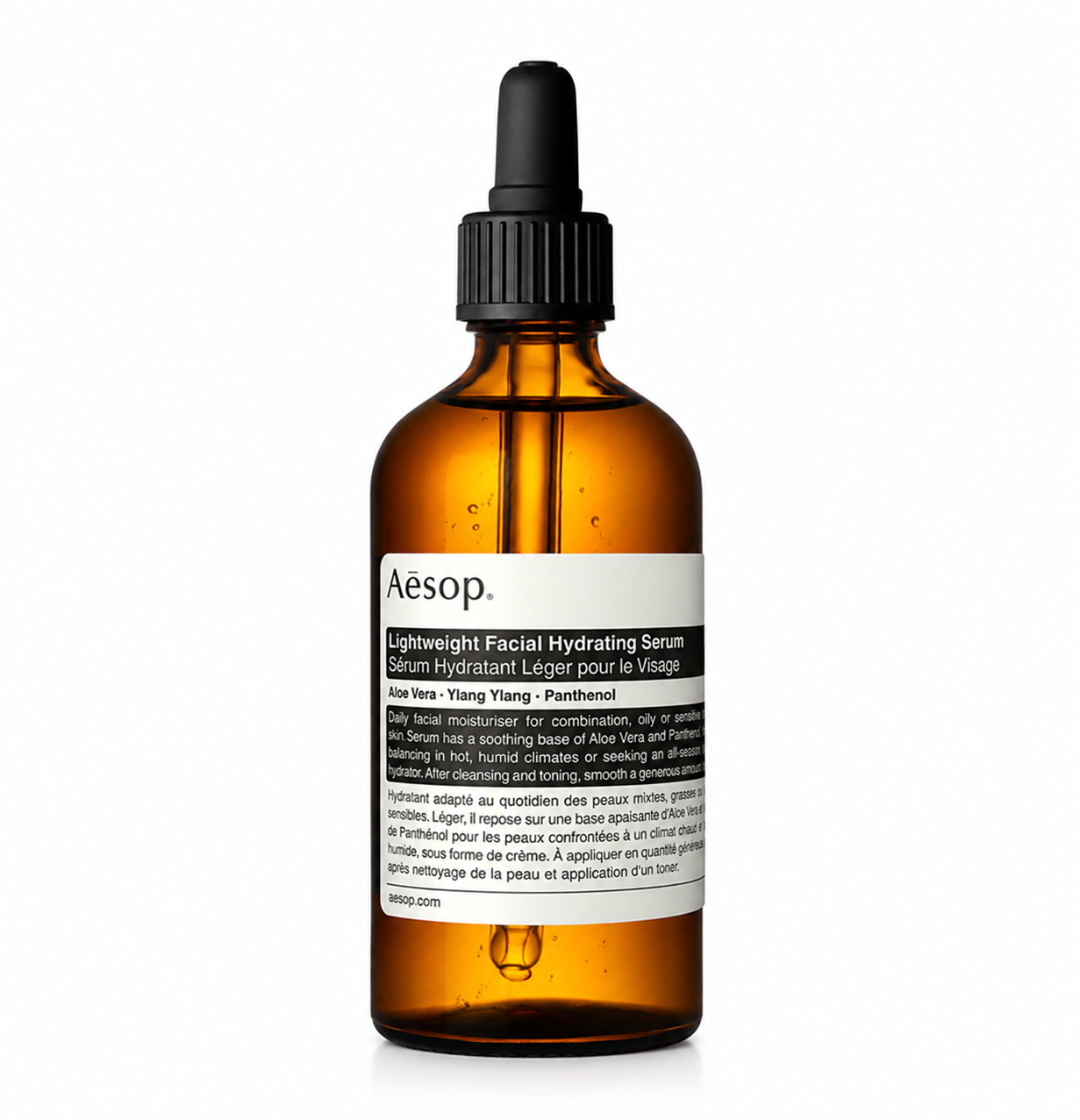 Aesop Lightweight Facial Hydrating Serum in an amber glass dropper bottle with a black pipette and Aesop's signature minimalist label, isolated on a white background. This lightweight facial serum is formulated with aloe vera, ylang ylang, and panthenol to provide fast-absorbing hydration, soothe combination, oily, and sensitive skin, and leave the complexion refreshed while showcasing Aesop's iconic apothecary-inspired packaging.