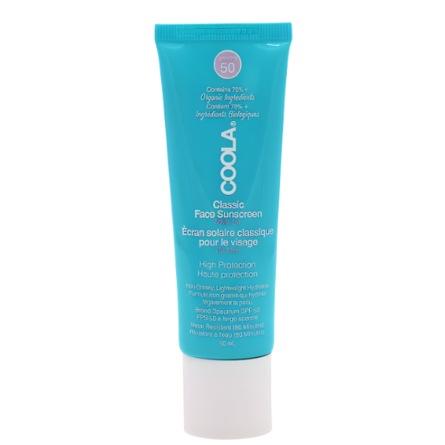 A 50ml tube of COOLA Classic Face Sunscreen in bright turquoise with a white screw-on cap, featuring SPF 50 high protection and White Tea scent branding.